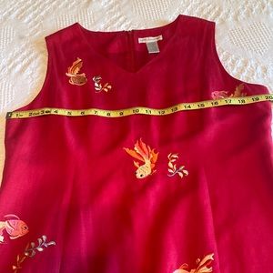 Vibrant, hot pink,  lined sheath dress.  Fun fish embellishments.